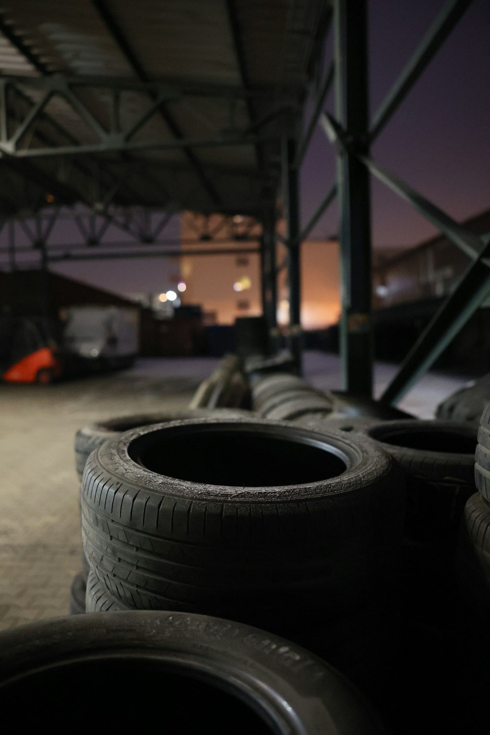 a row of tires sitting in a warehouse