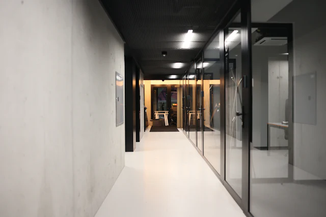 Corridor Glazing Run — commercial glass partition interior design