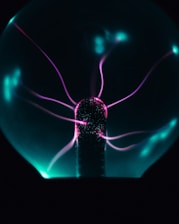 a glass ball with a purple light inside of it