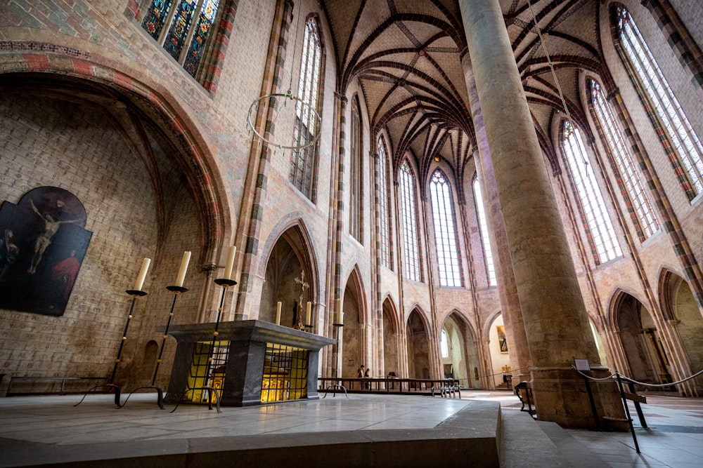 a large cathedral with high vaulted ceilings and stained glass windows