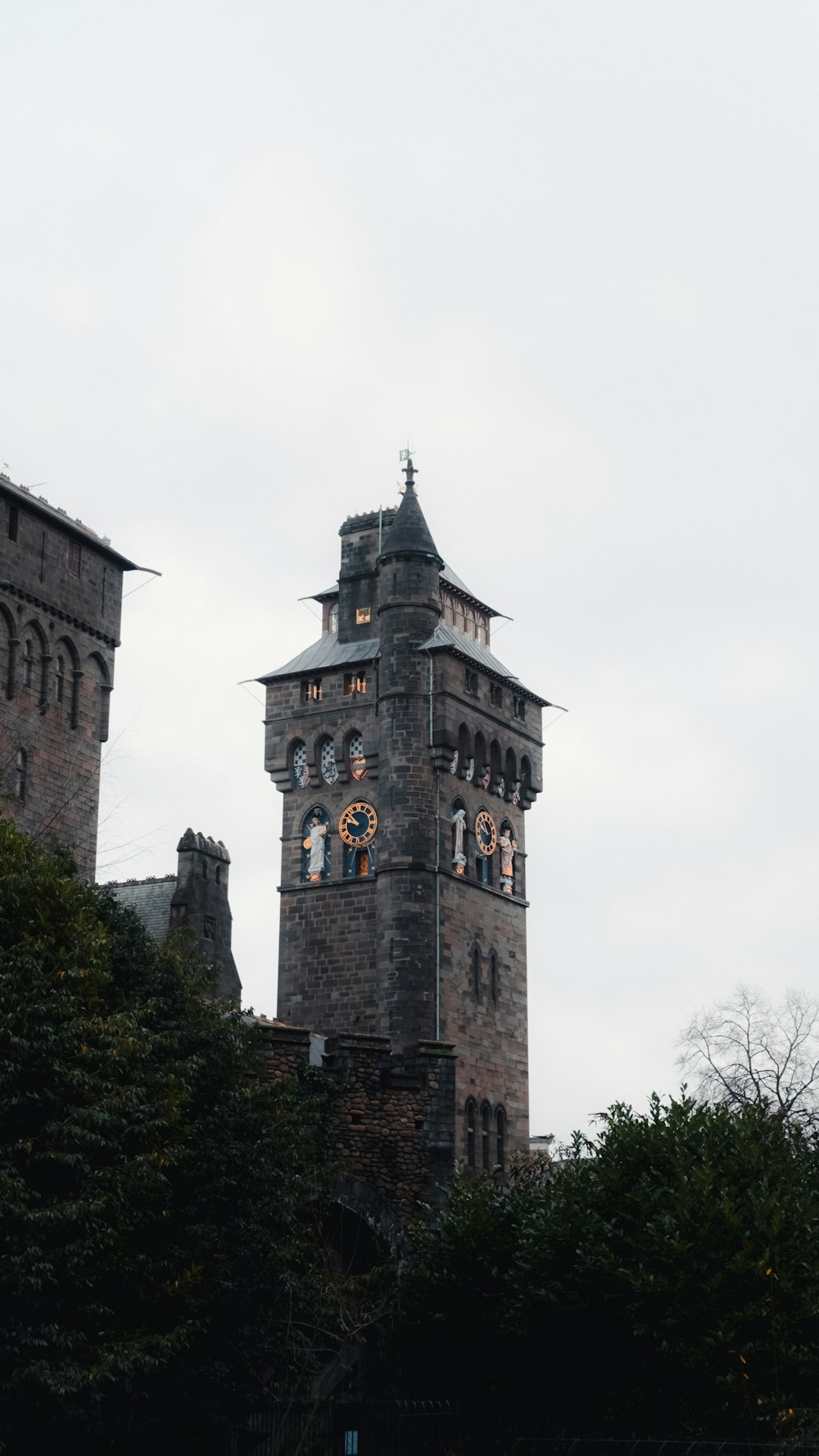 a tall tower with a clock on the top of it