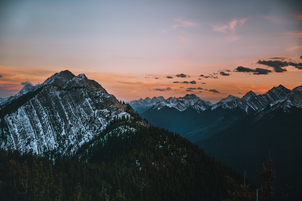 a view of a mountain range at sunset