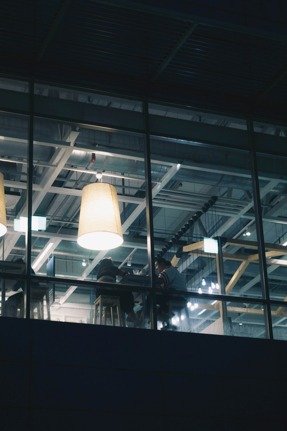 a couple of lamps that are sitting in a room