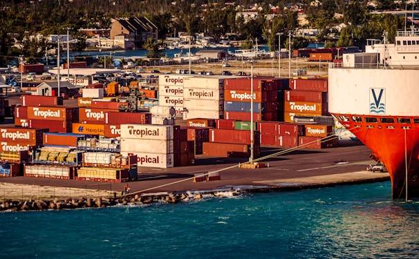 a large cargo ship docked in a harbor