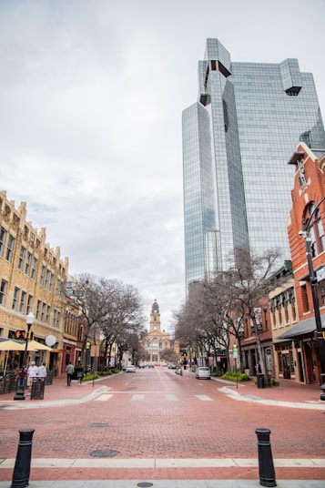 a city street lined with tall buildings next to each other Texas 