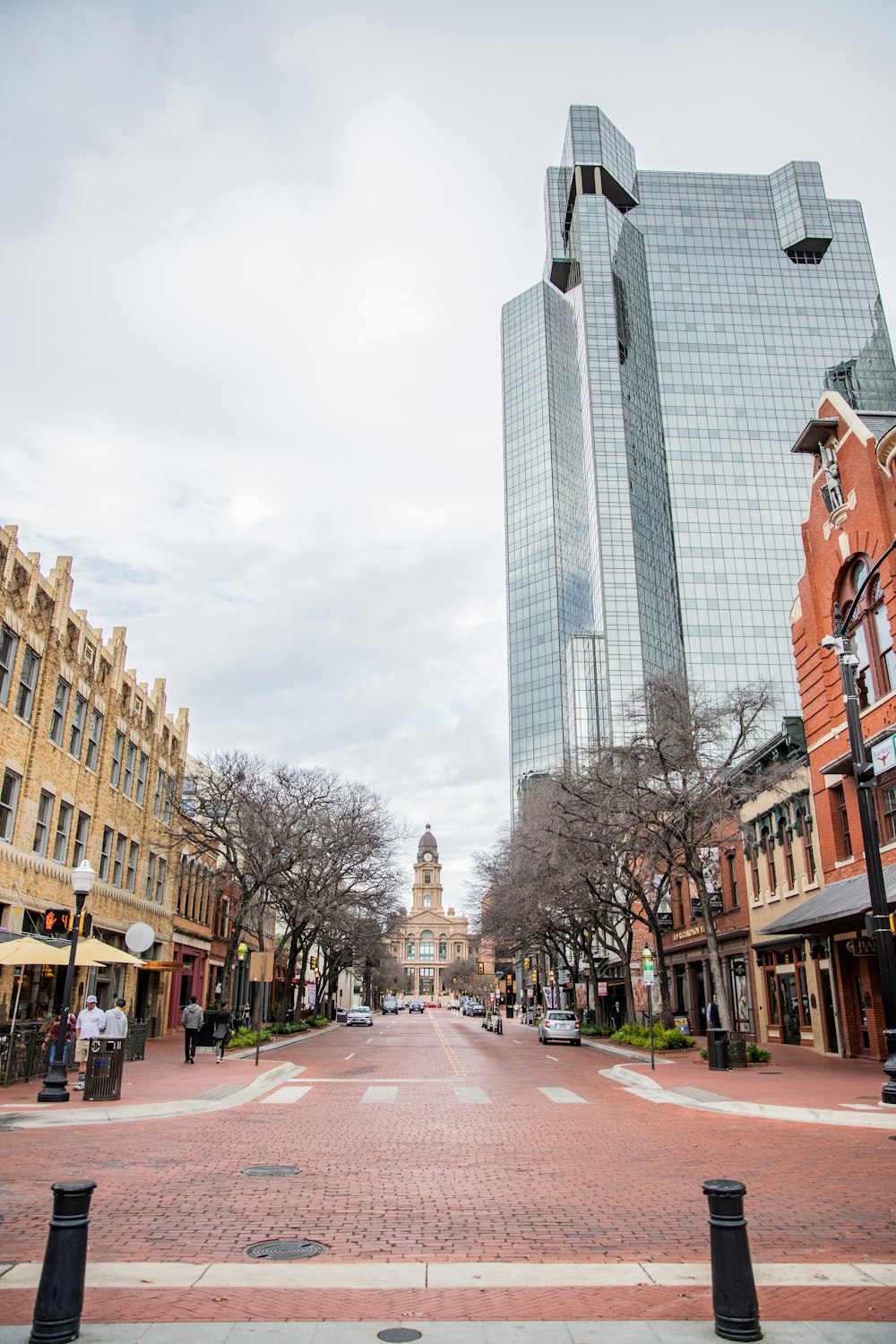 a city street lined with tall buildings next to each other