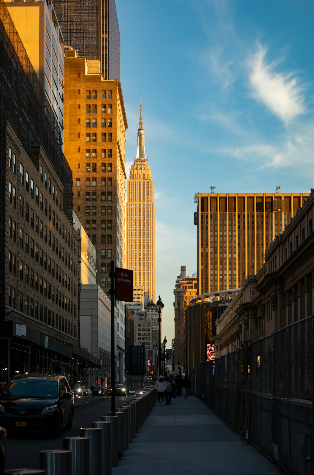 a city street lined with tall buildings