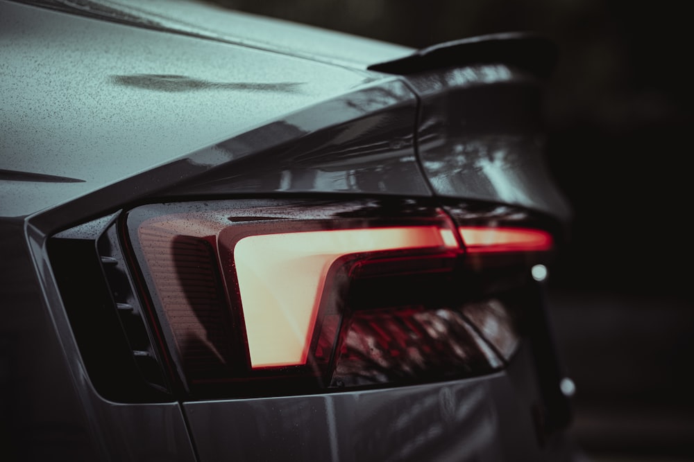 a close up of the tail lights of a car