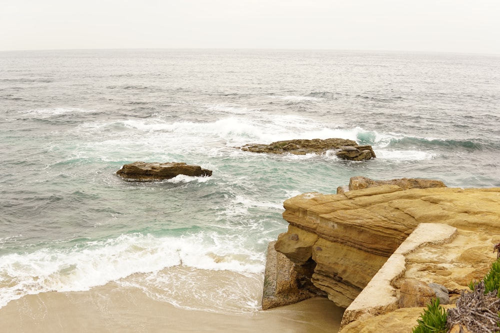 a view of the ocean from a cliff