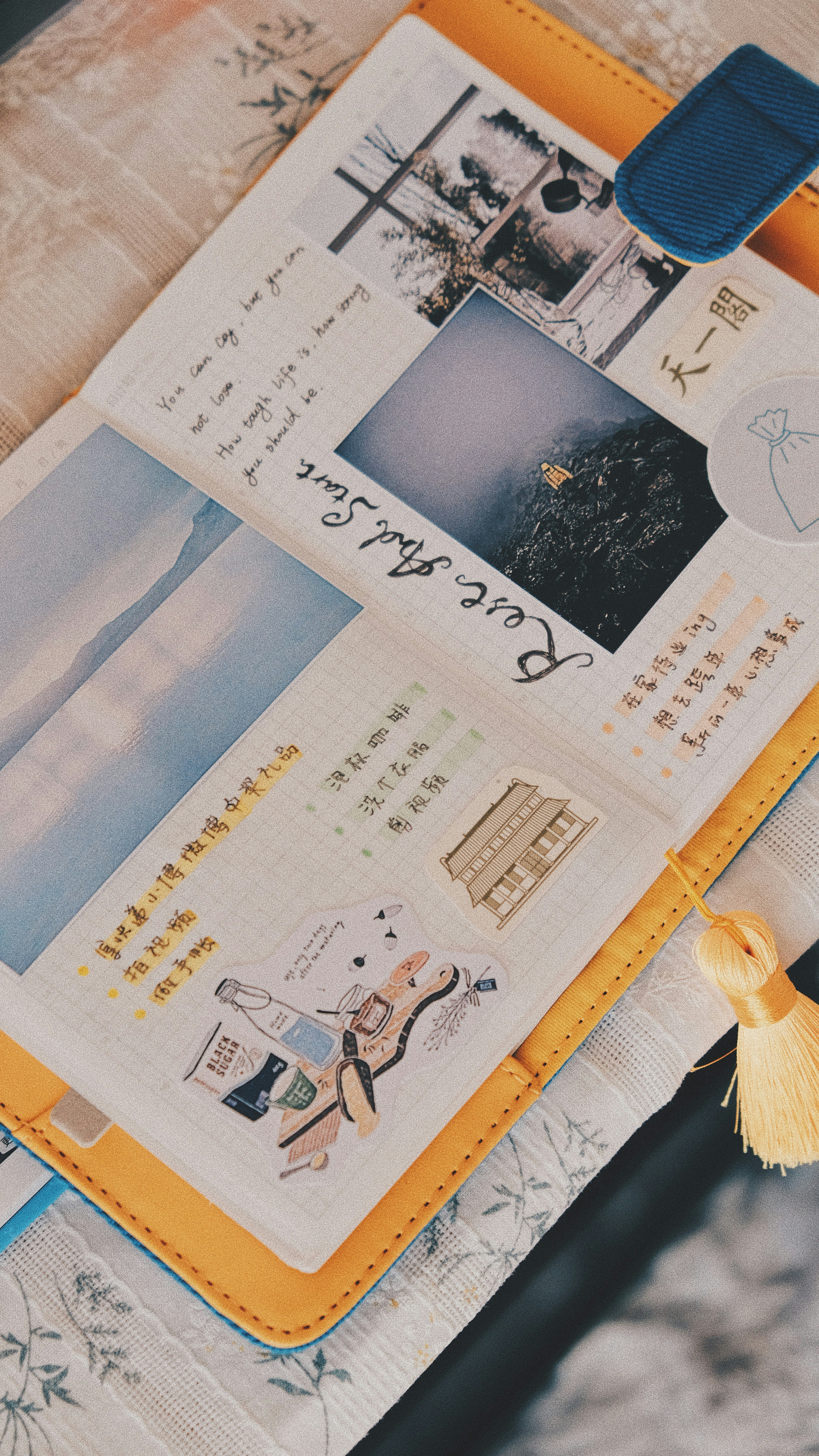 a book with a tassel on top of it