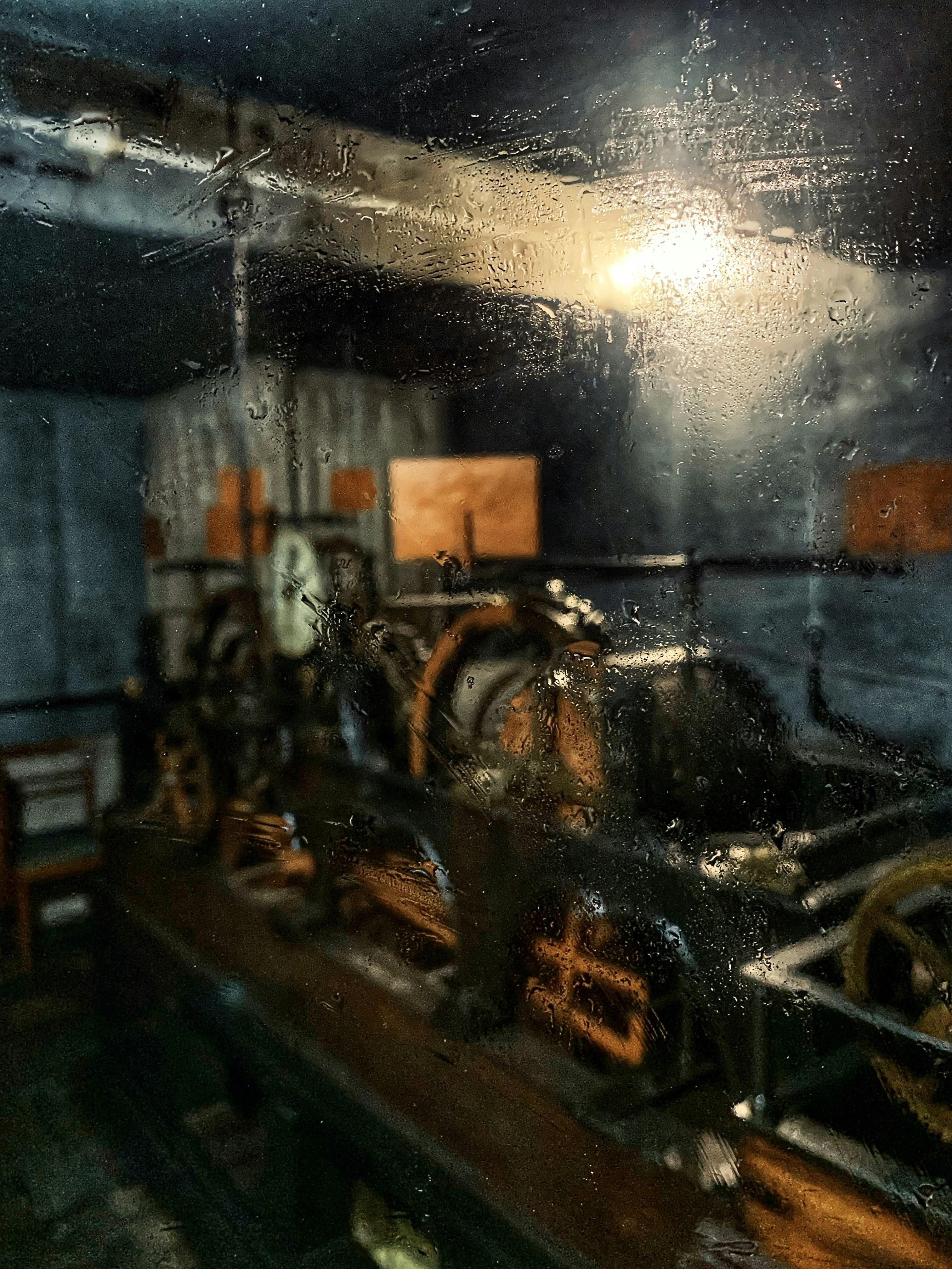 a steam engine sitting on top of a wooden table