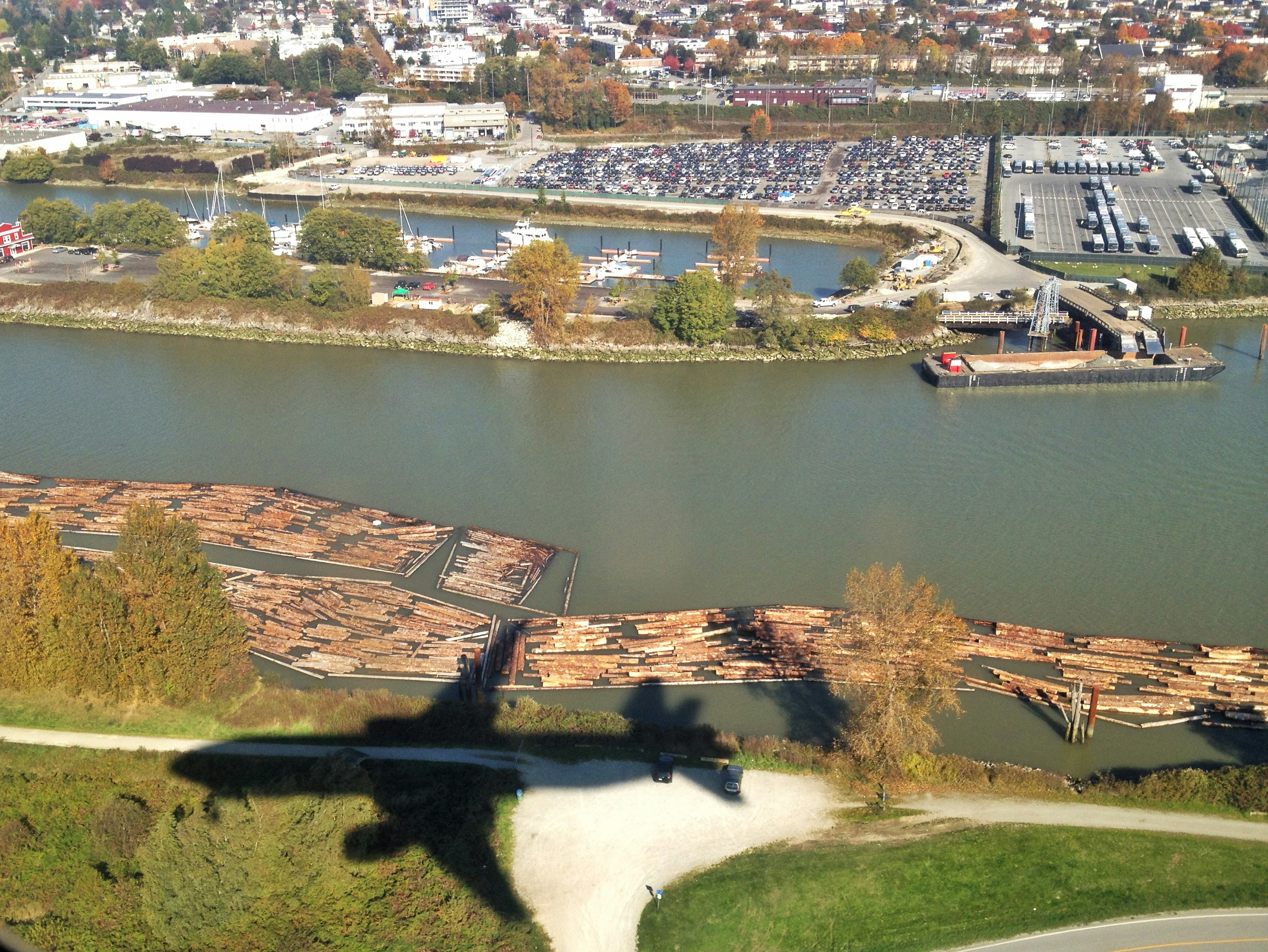 a plane is flying over a body of water