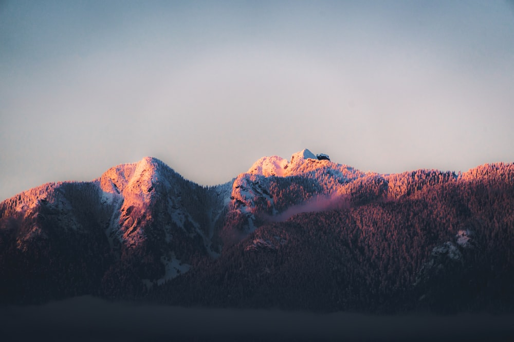 a view of a mountain range at sunset