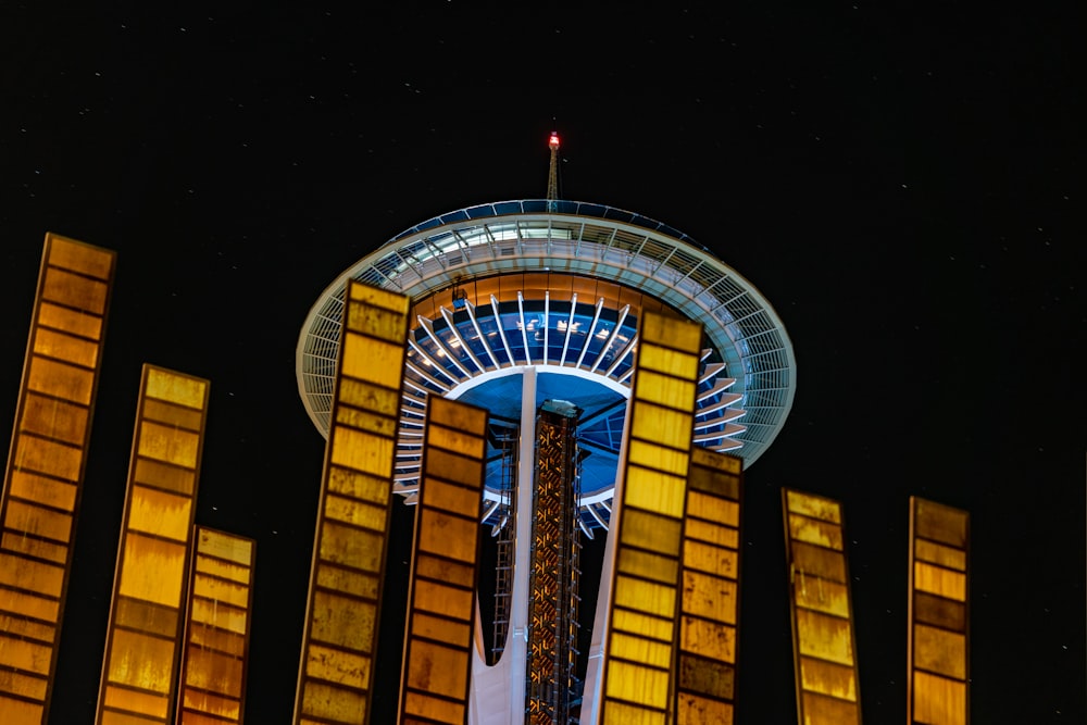 a very tall tower with a sky scraper on top of it