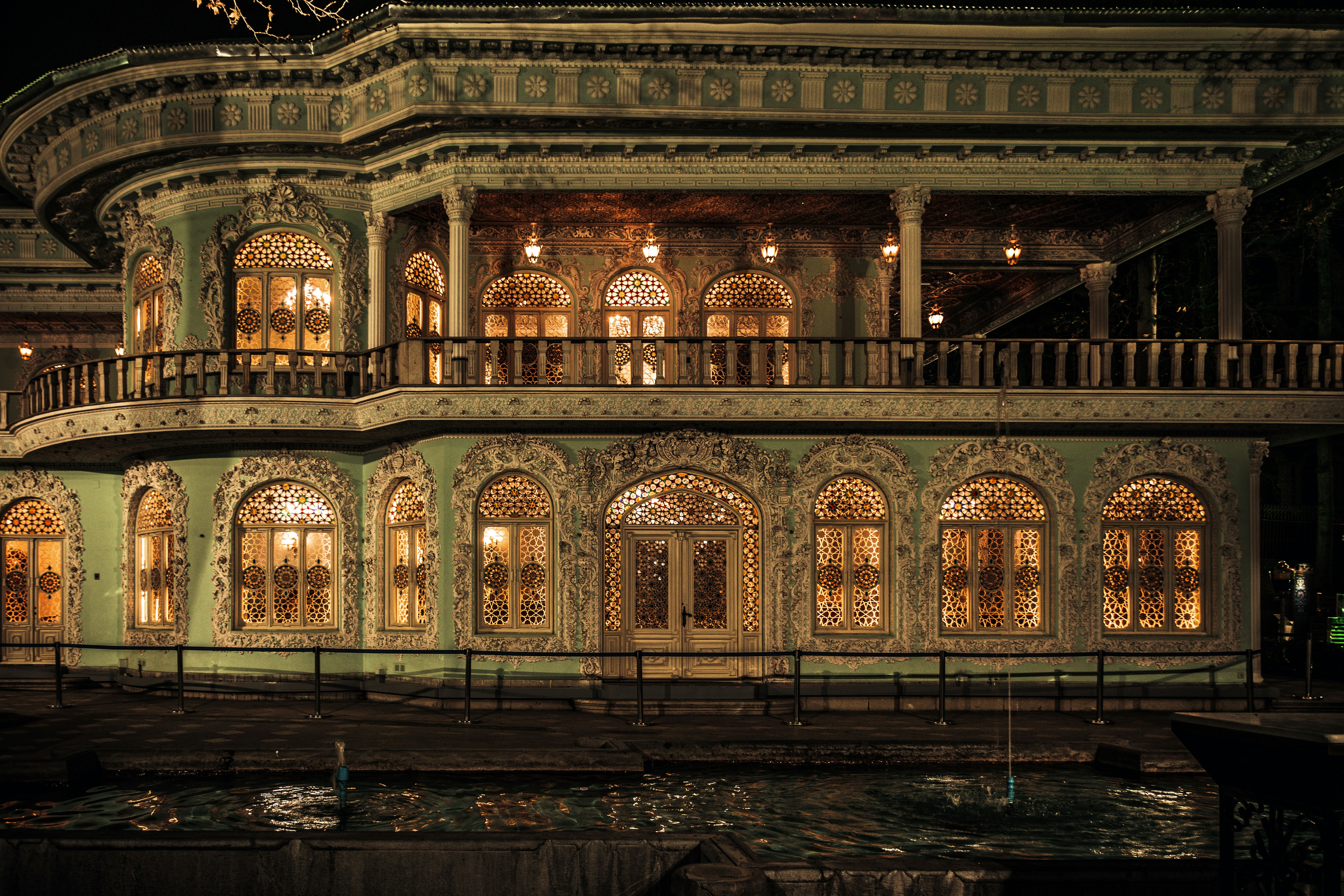 a large building with many windows lit up at night