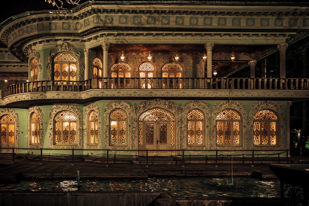 a large building with many windows lit up at night