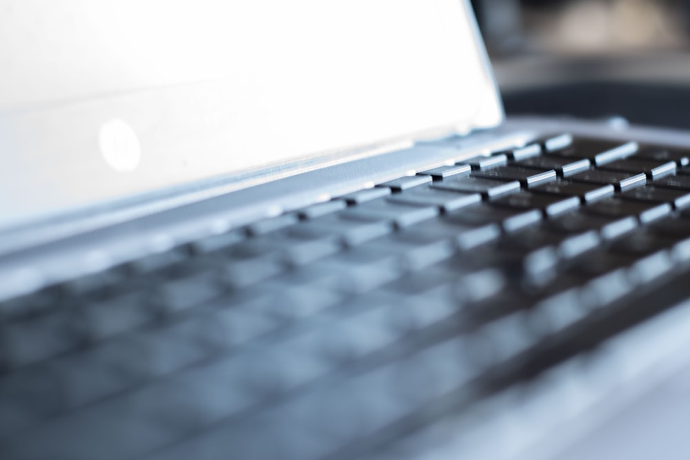 a close up of a laptop computer keyboard