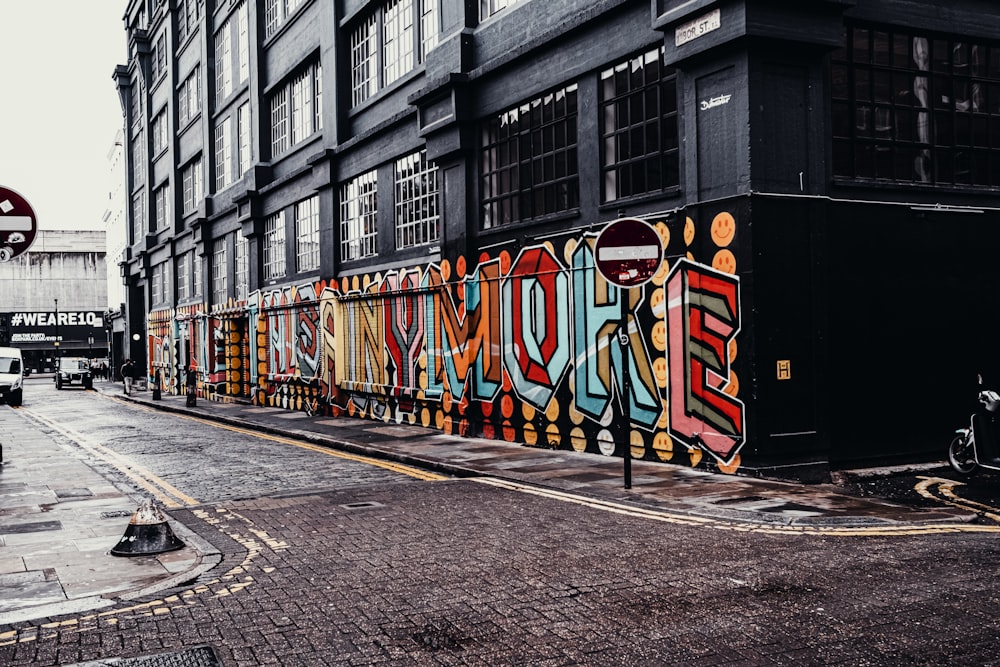 a street scene with focus on the side of a building