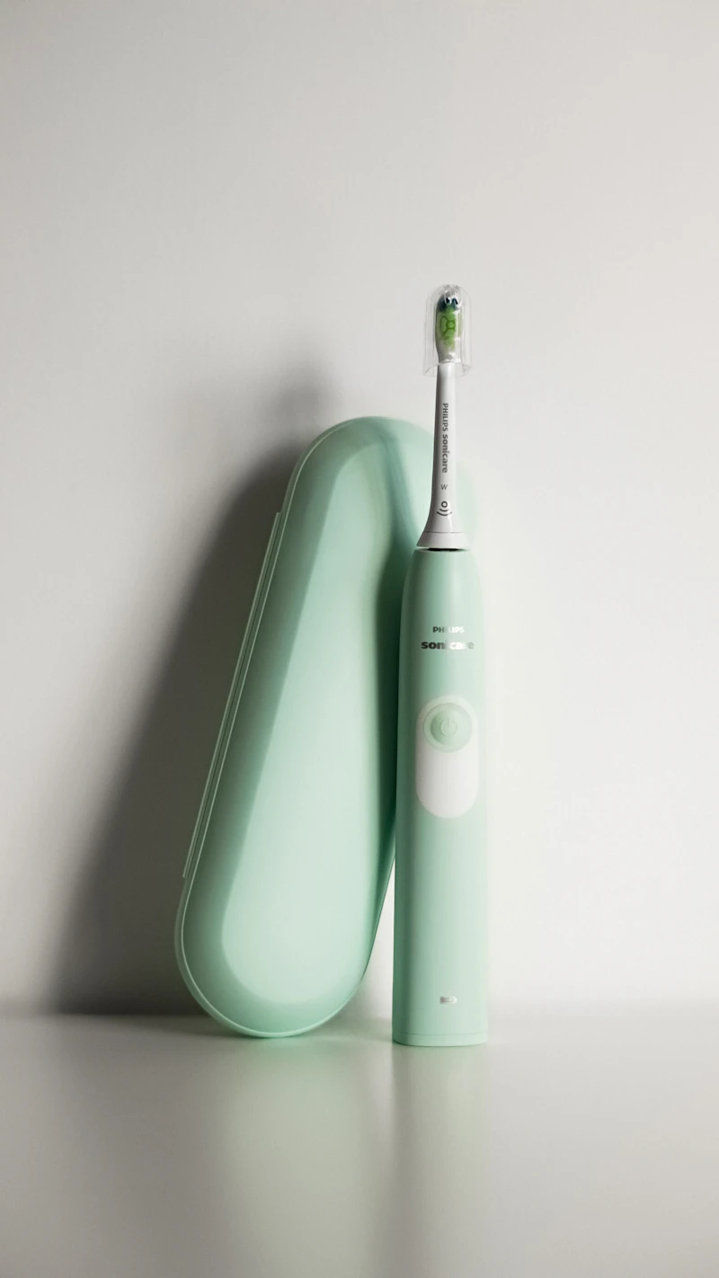 sonic electric toothbrush in modern bathroom