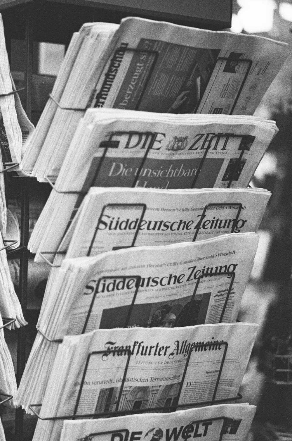 a stack of newspapers sitting next to each other