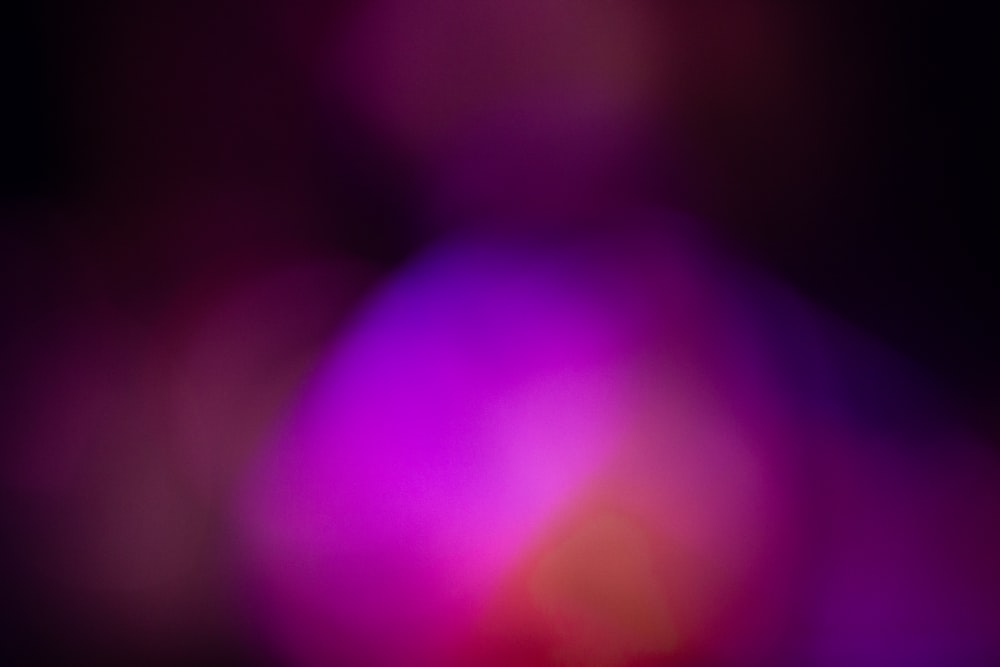 a blurry image of a purple light