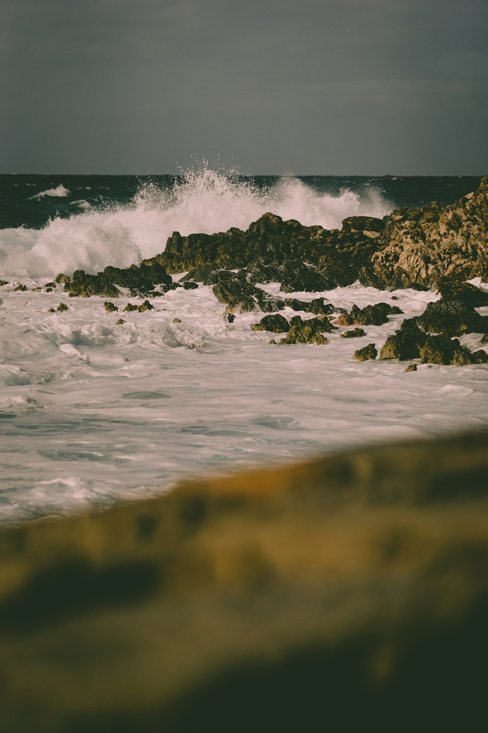 a large body of water surrounded by rocks