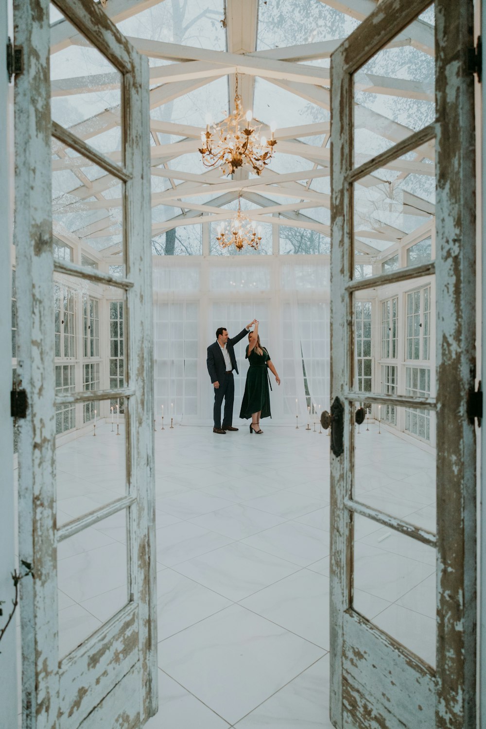 a couple of people standing in a room