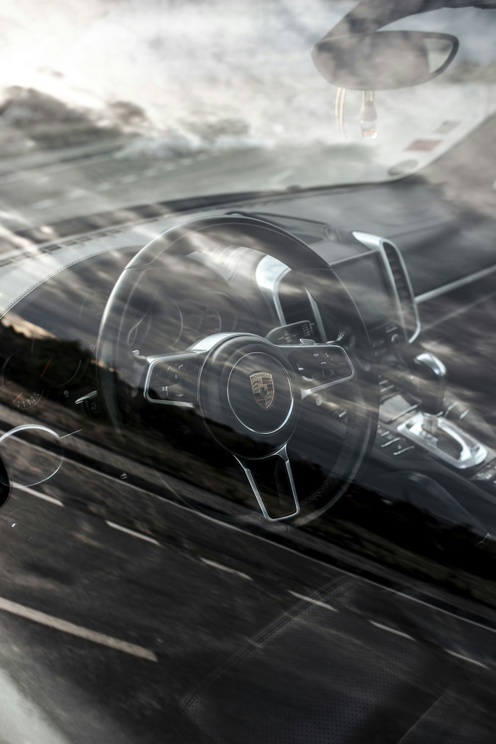 a car with a steering wheel and a dashboard