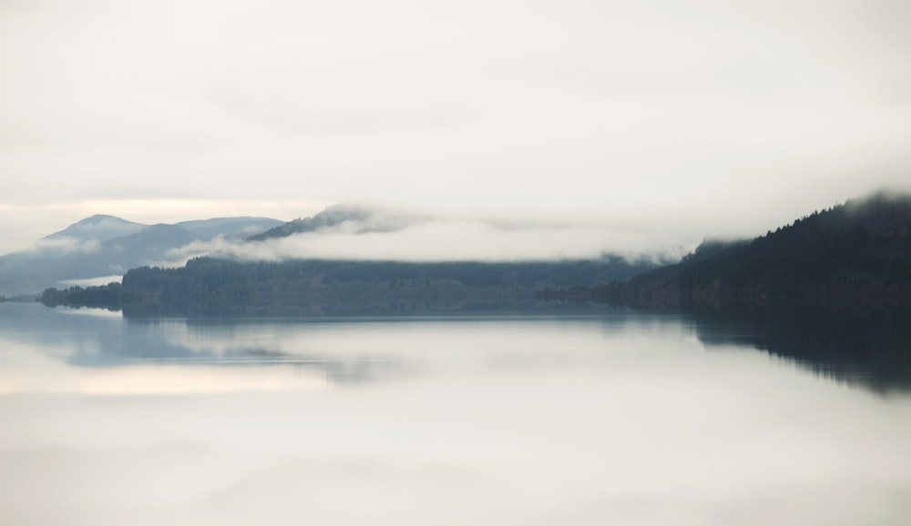 a large body of water surrounded by mountains