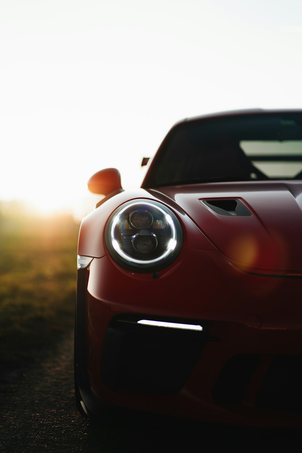 a close up of a red sports car