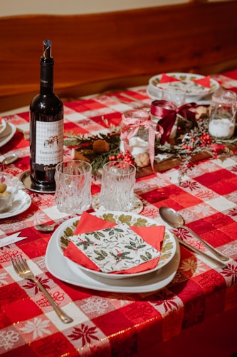 Friends gathered around a dinner table with warm lighting