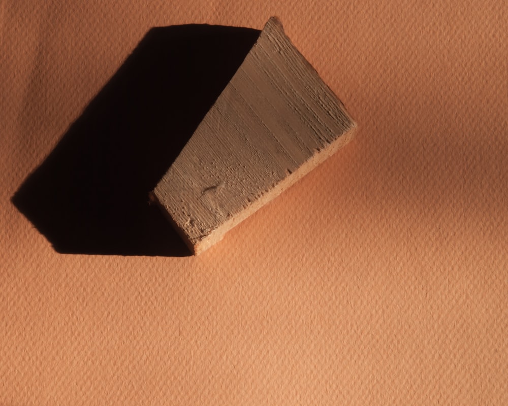 a piece of wood sitting on top of a table