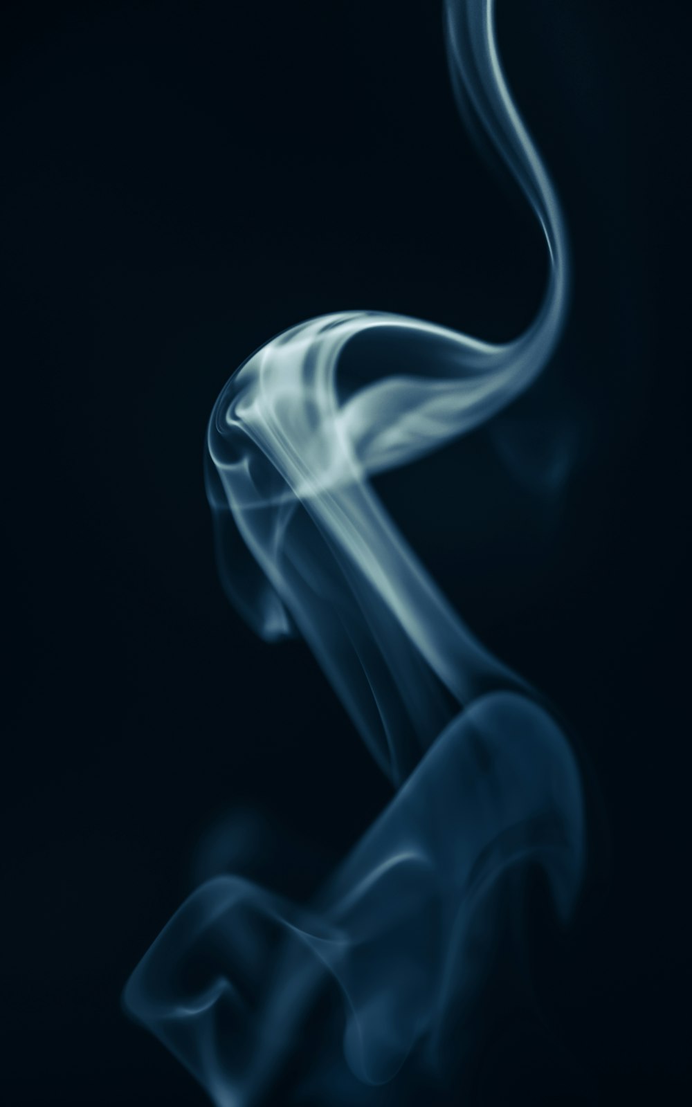 a blue smoke texture on a black background