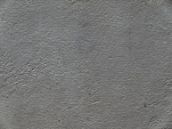 a black and white photo of a concrete wall