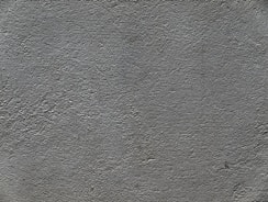 a black and white photo of a concrete wall