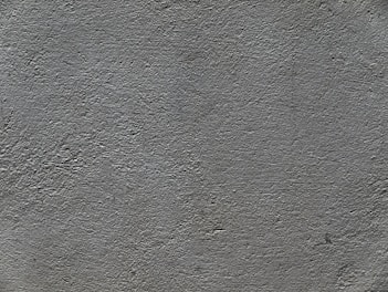 a black and white photo of a concrete wall