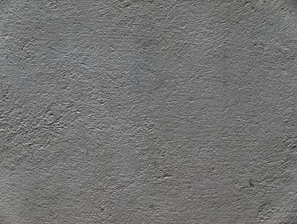a black and white photo of a concrete wall