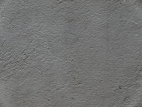 a black and white photo of a concrete wall