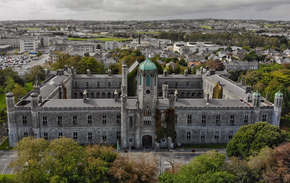 an aerial view of a large building in a city