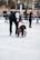 A dedicated coach providing guidance to young skiers at Saku Suusaklubi.