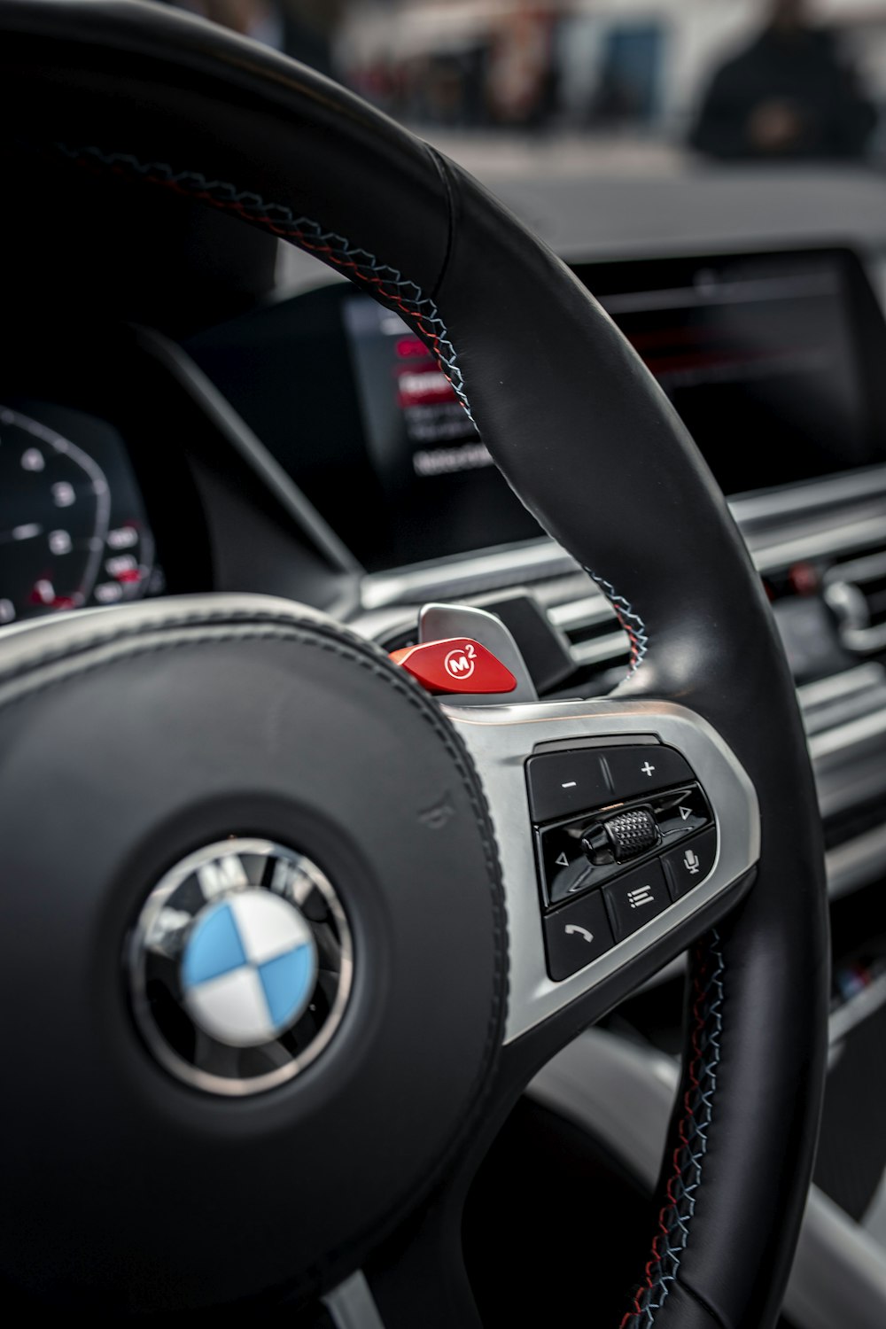 a close up of a steering wheel of a car