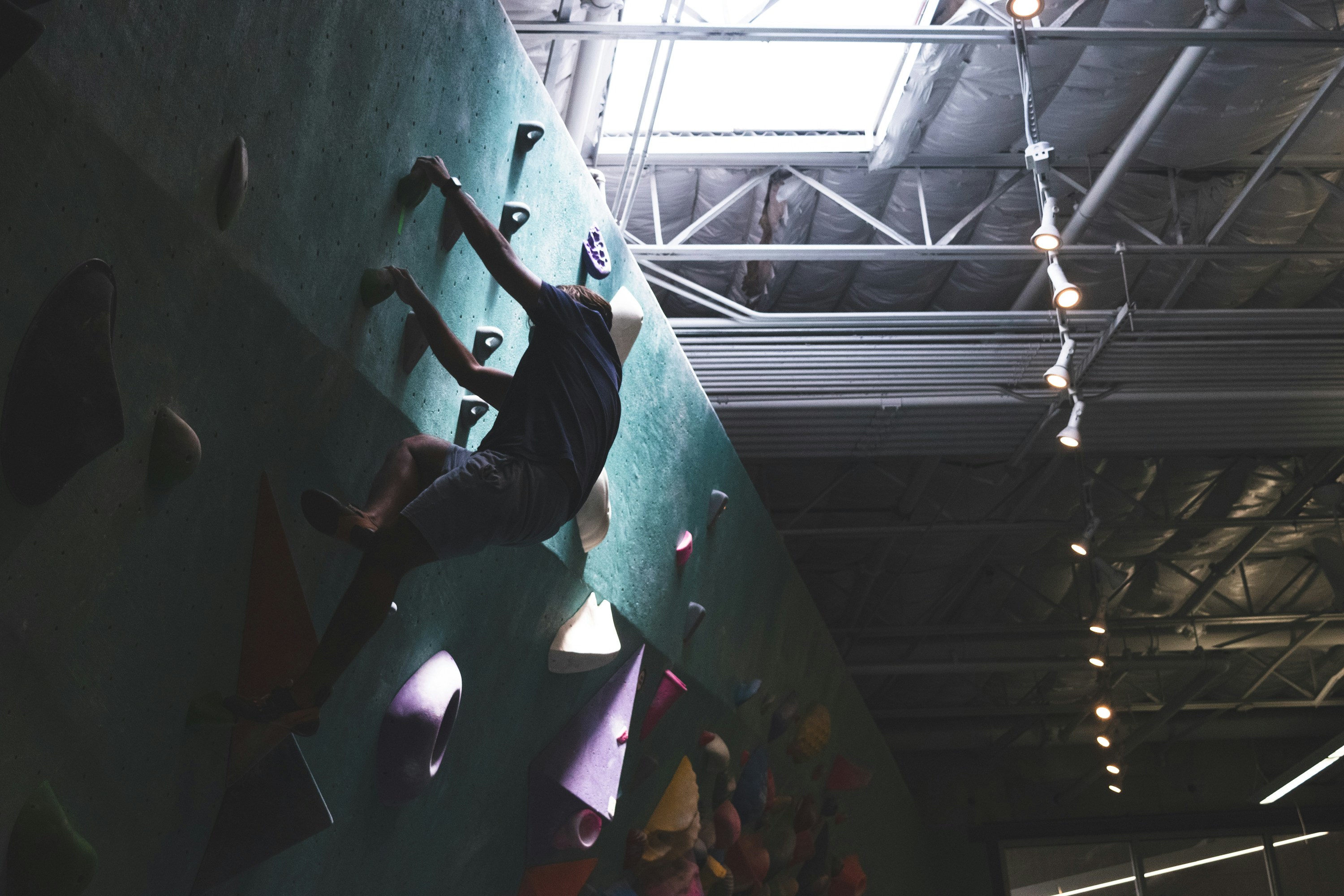 Athlete training on climbing wall