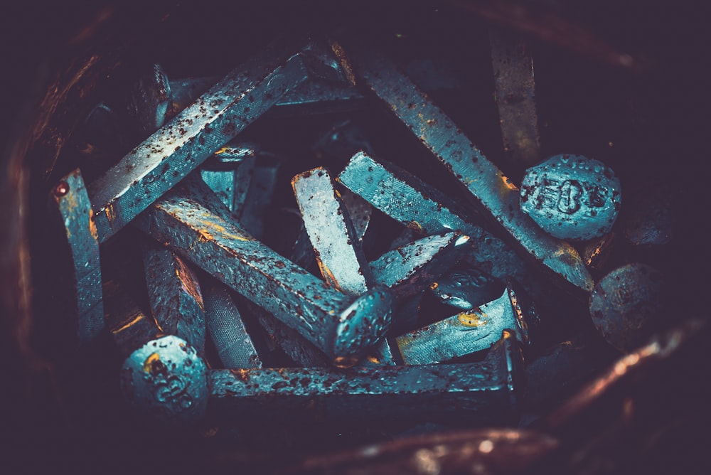 a pile of metal scraps in a basket