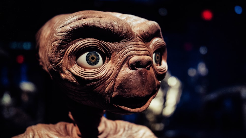a close up of a statue of an alien