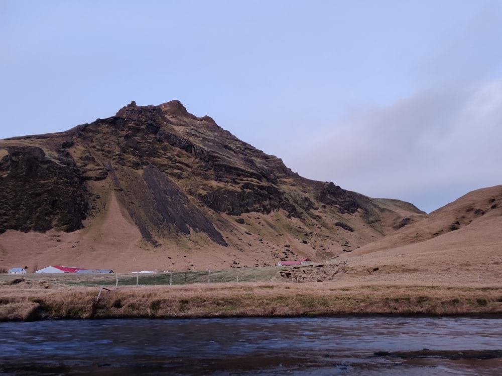 a mountain with a river running through it