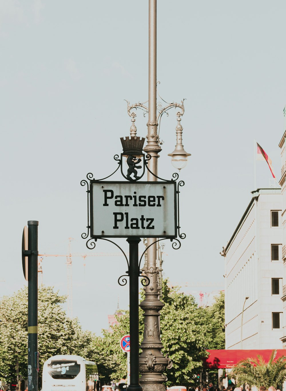 a street light with a sign on it