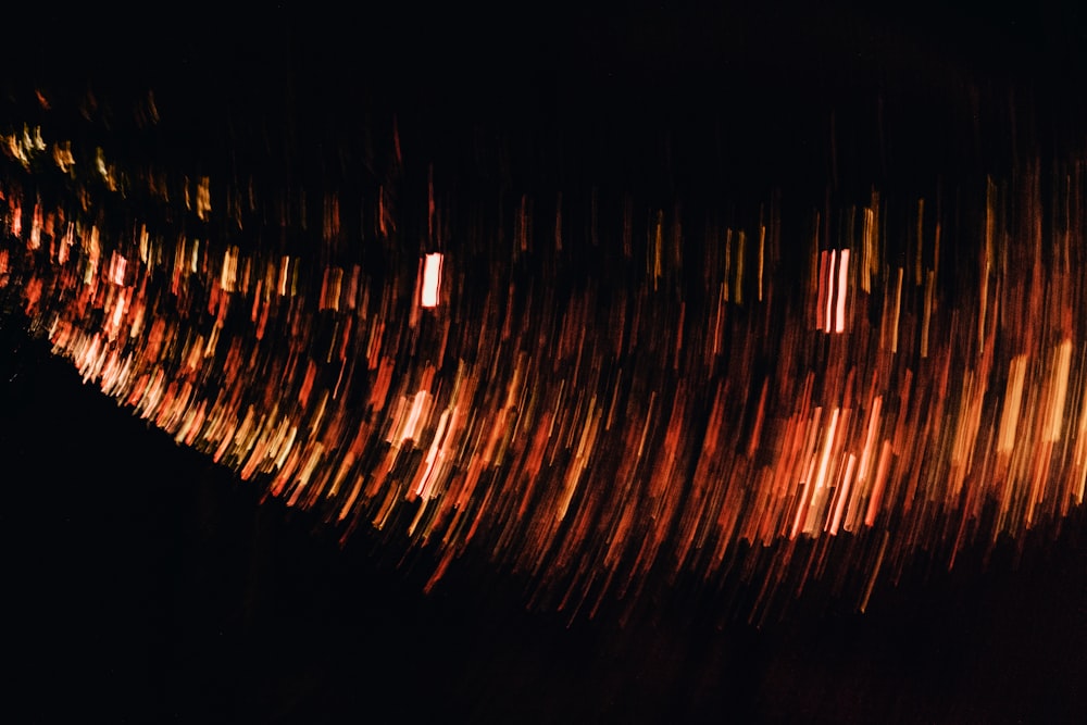 a blurry image of lights in the dark