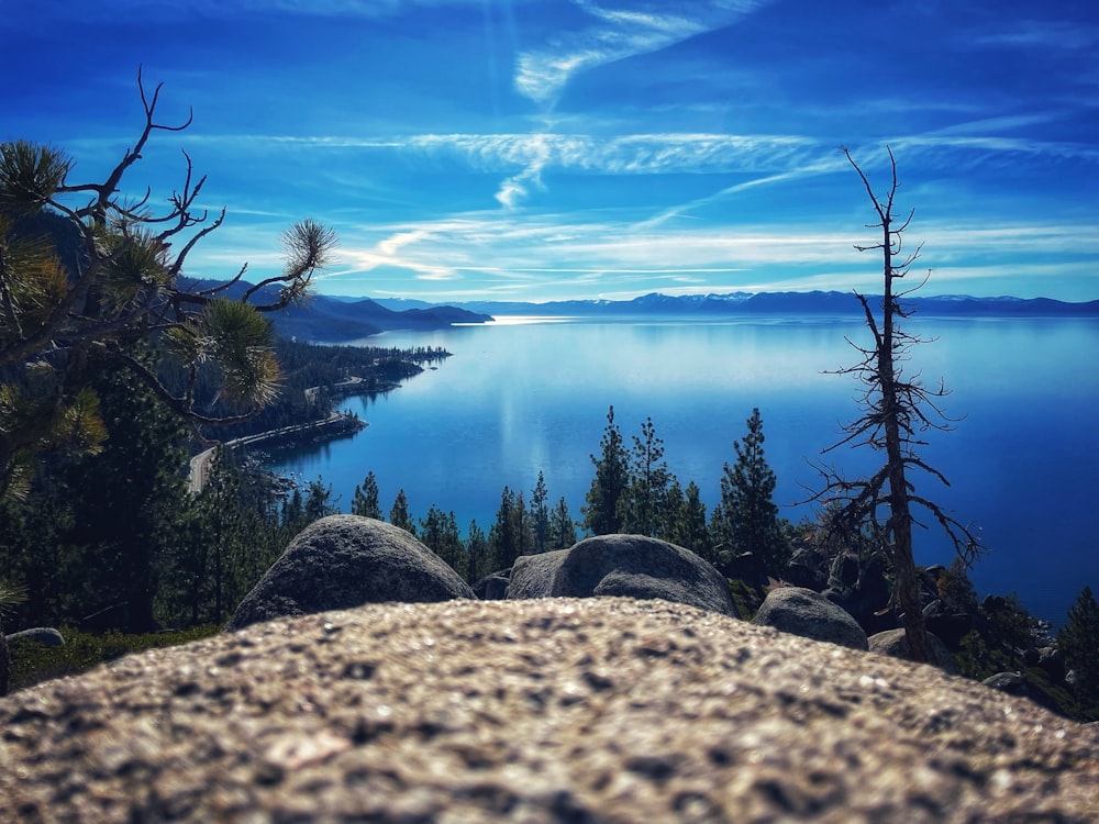 a view of a body of water from a hill