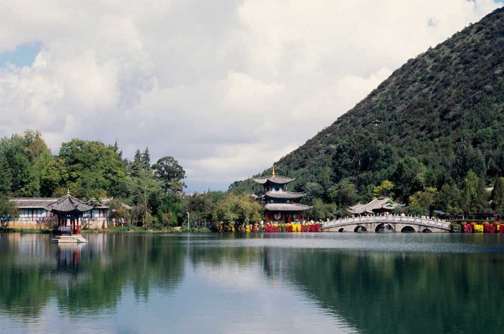 a large body of water with a bridge in the middle of it