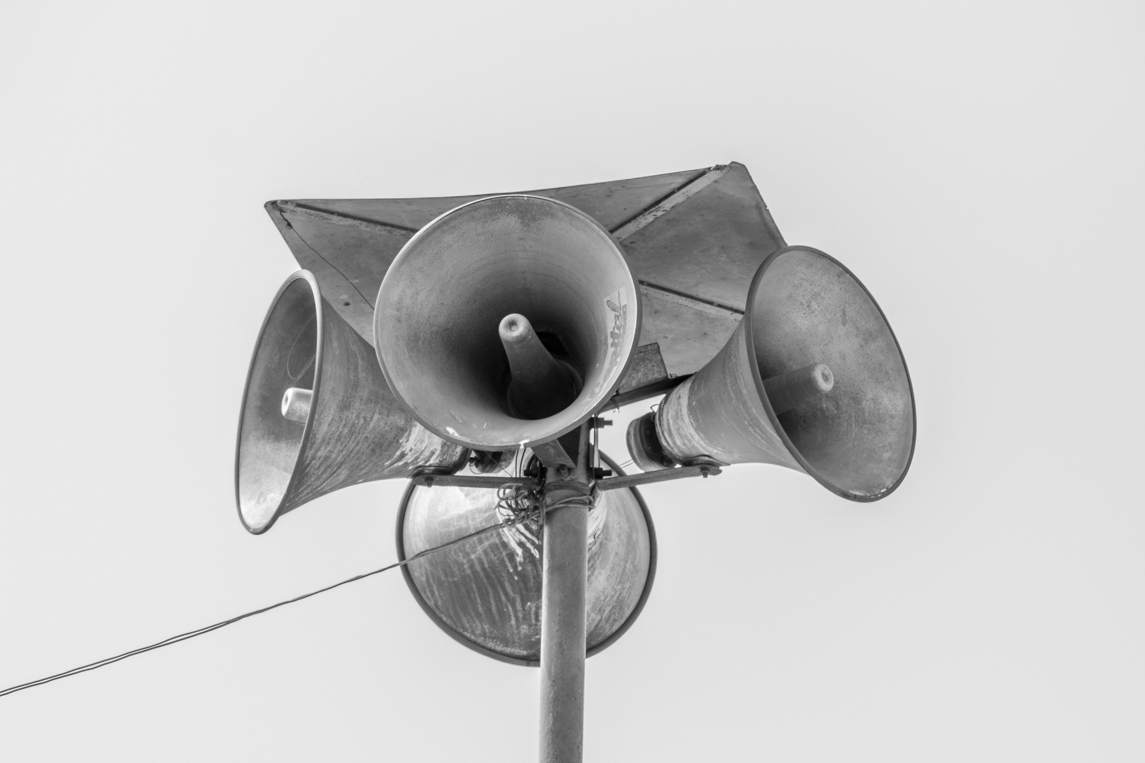 a black and white photo of a street light